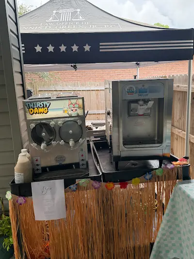 Frozen drink and soft serve ice cream rental machines set up for a party in Pensacola, Florida